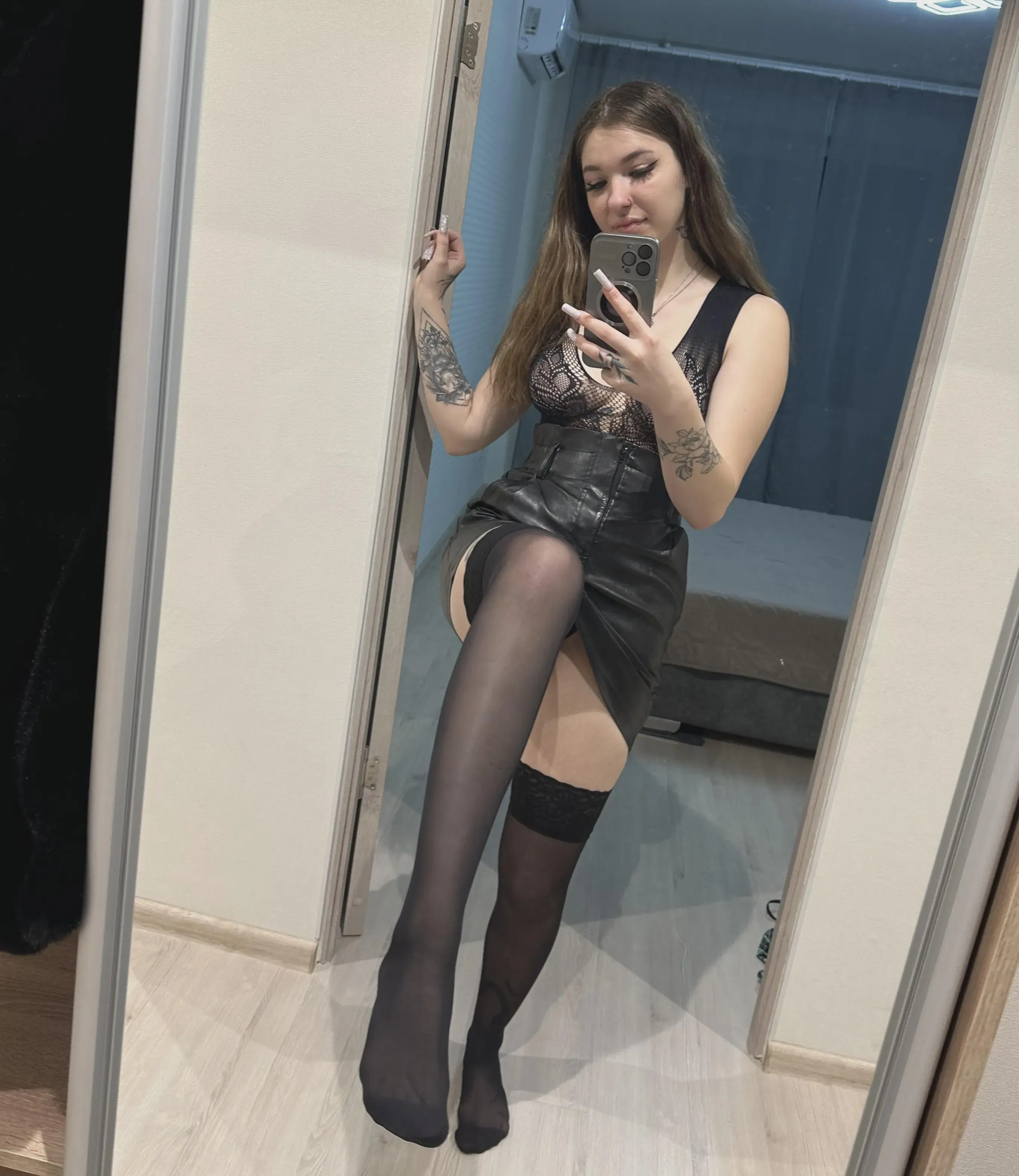 The leather skirt looks good on me