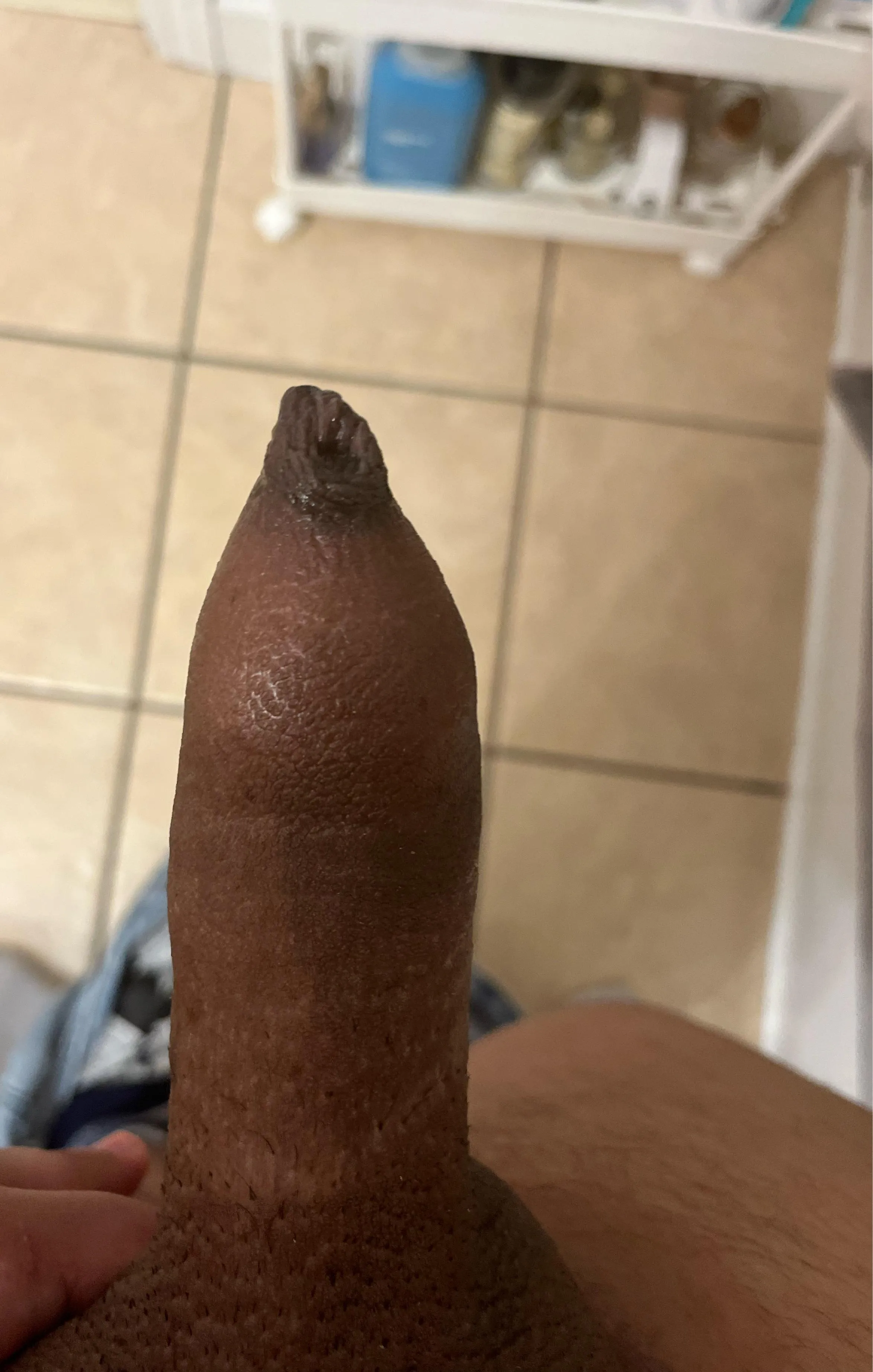 As far back as my foreskin goes