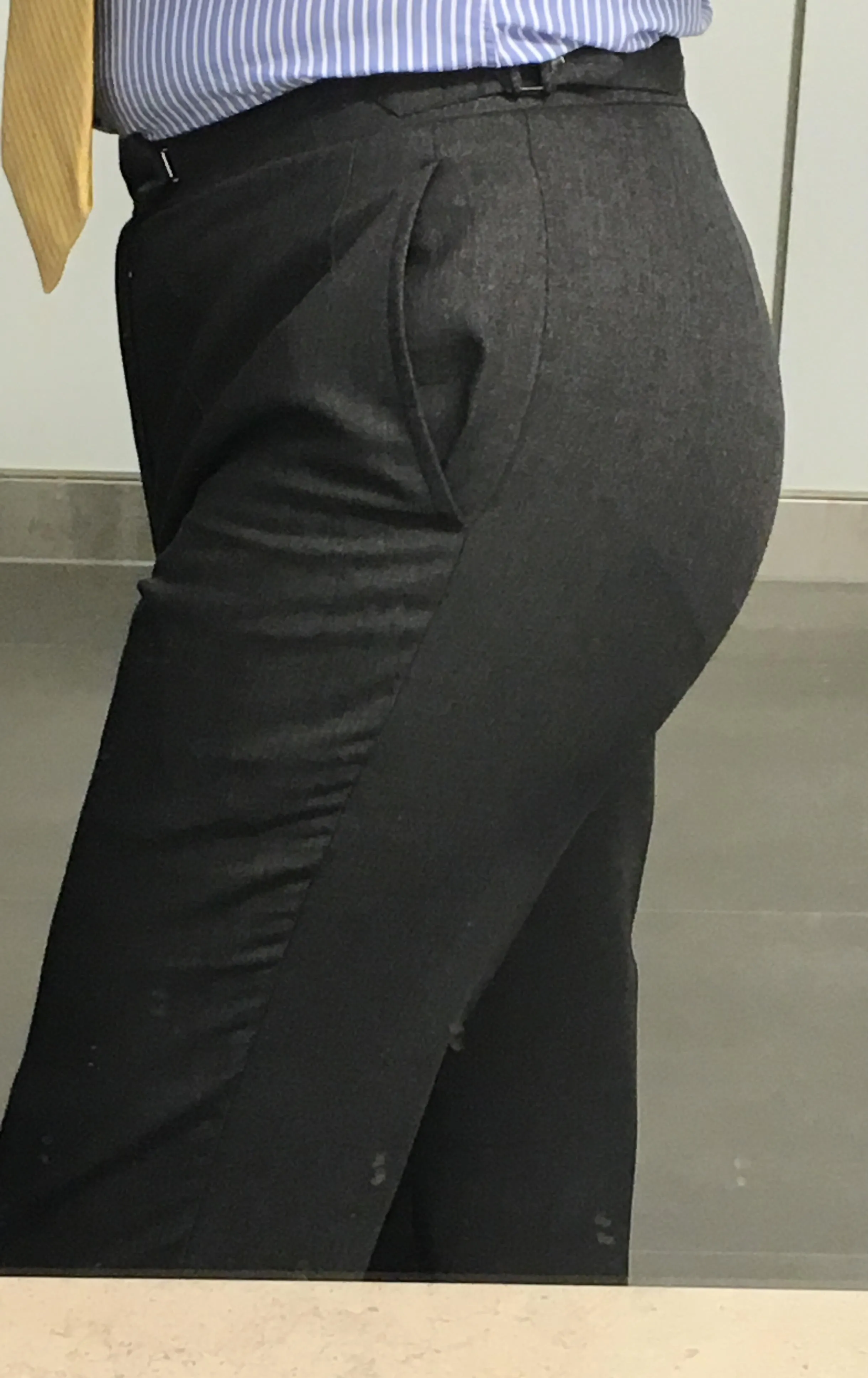 In my charcoal grey suit today (lighter shades of grey don’t suit me.) My brieflines are more obvious with these trousers.