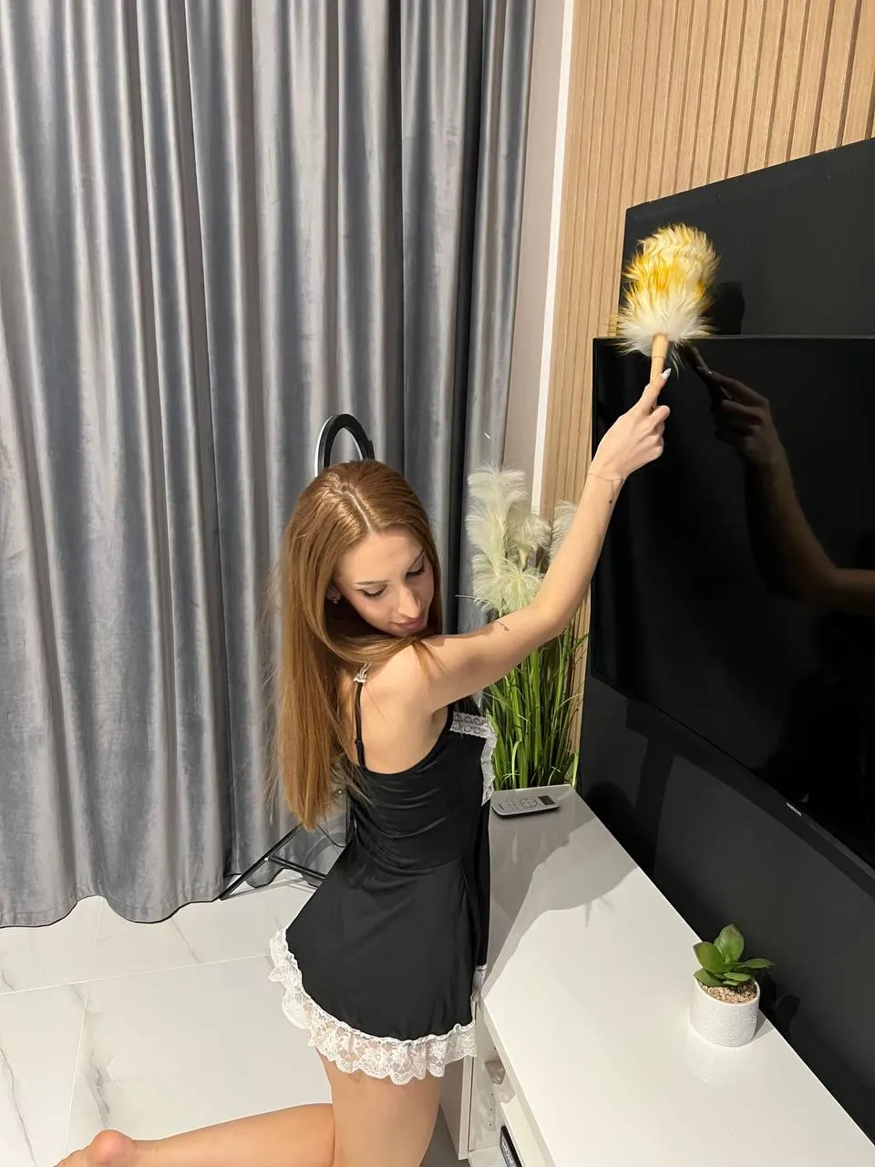 Pretty maid ready to serve