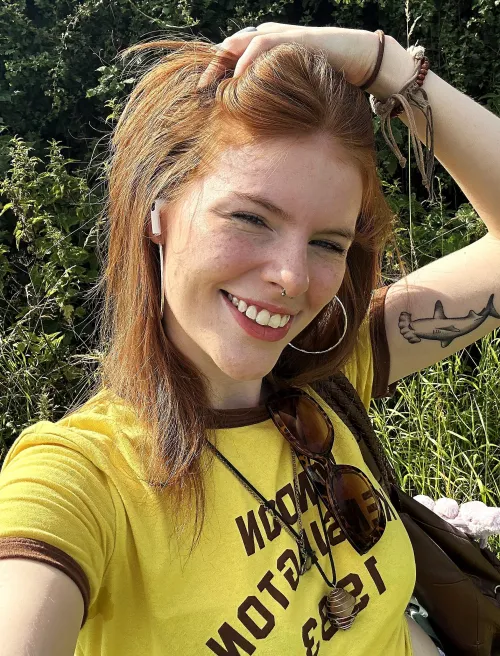 Tattoo, freckles and a pretty smile
