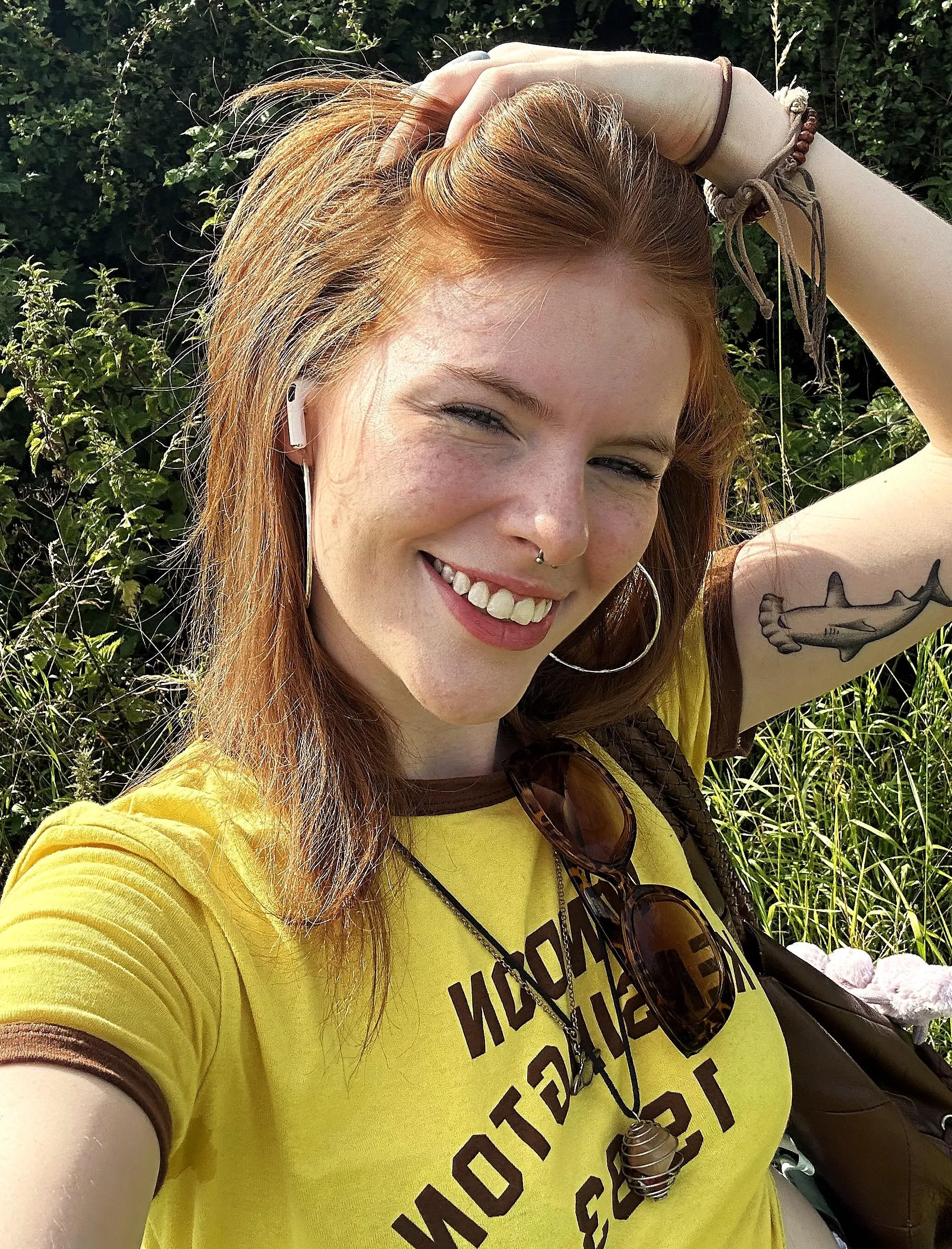 Tattoo, freckles and a pretty smile