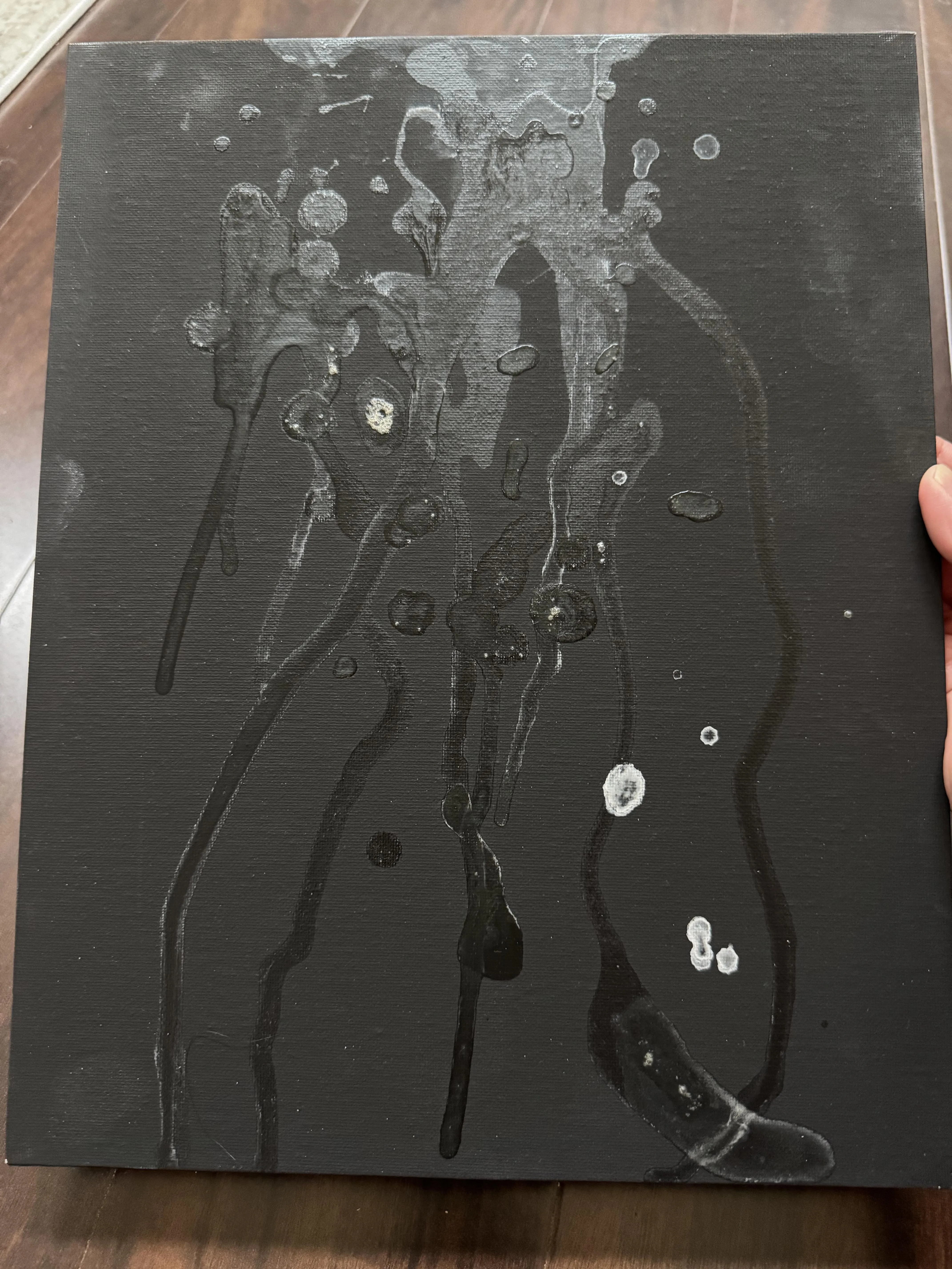 24m made some artwork on a black canvas