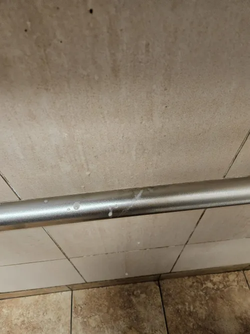 (28) second time at that gas station. Most of it dripped down already, hard to see on that tiles :P