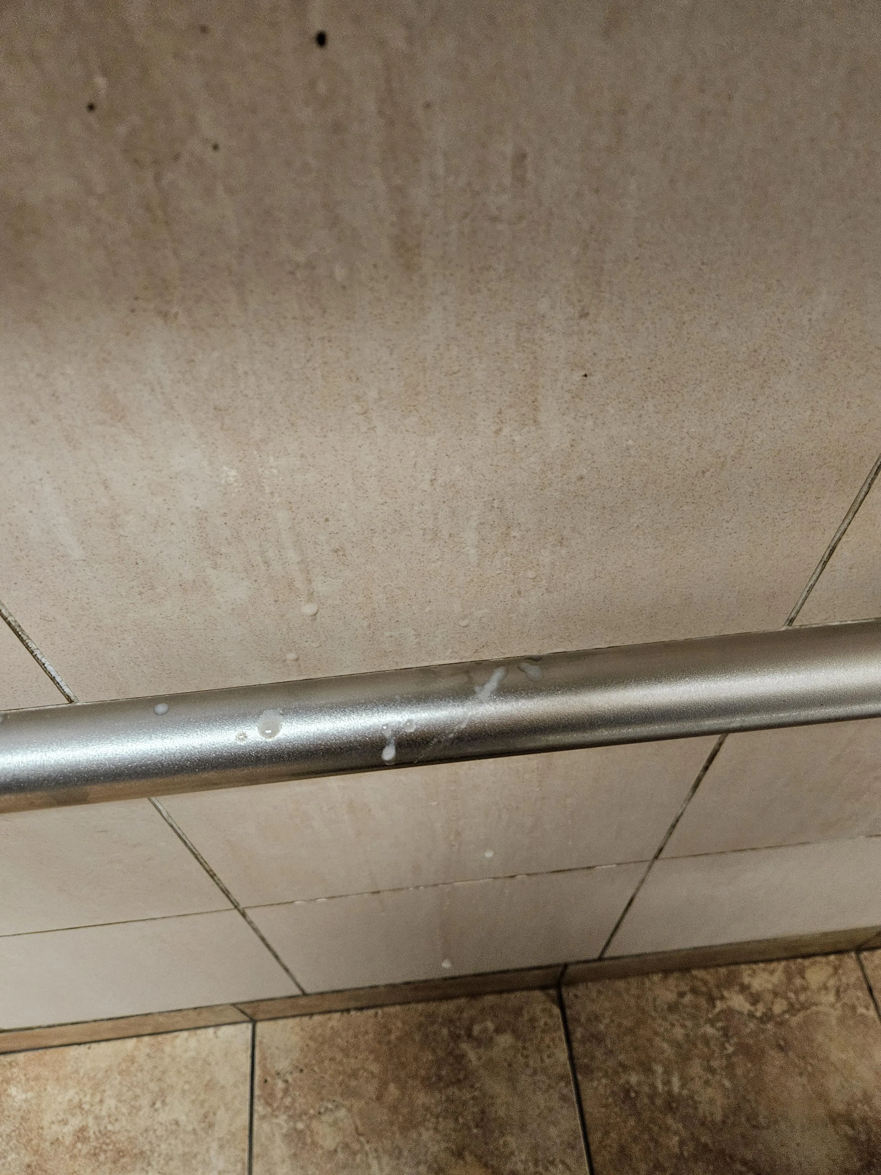 (28) second time at that gas station. Most of it dripped down already, hard to see on that tiles :P