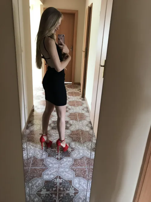 Red heels and long sexy legs bring joy into your life