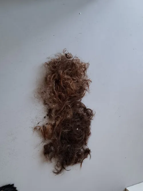 Whose hair is missing?