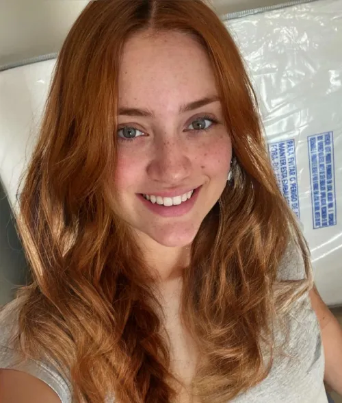 Freckles, redhead and smiles