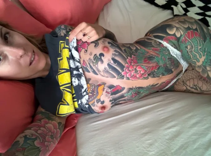 tattoo boobs out to play