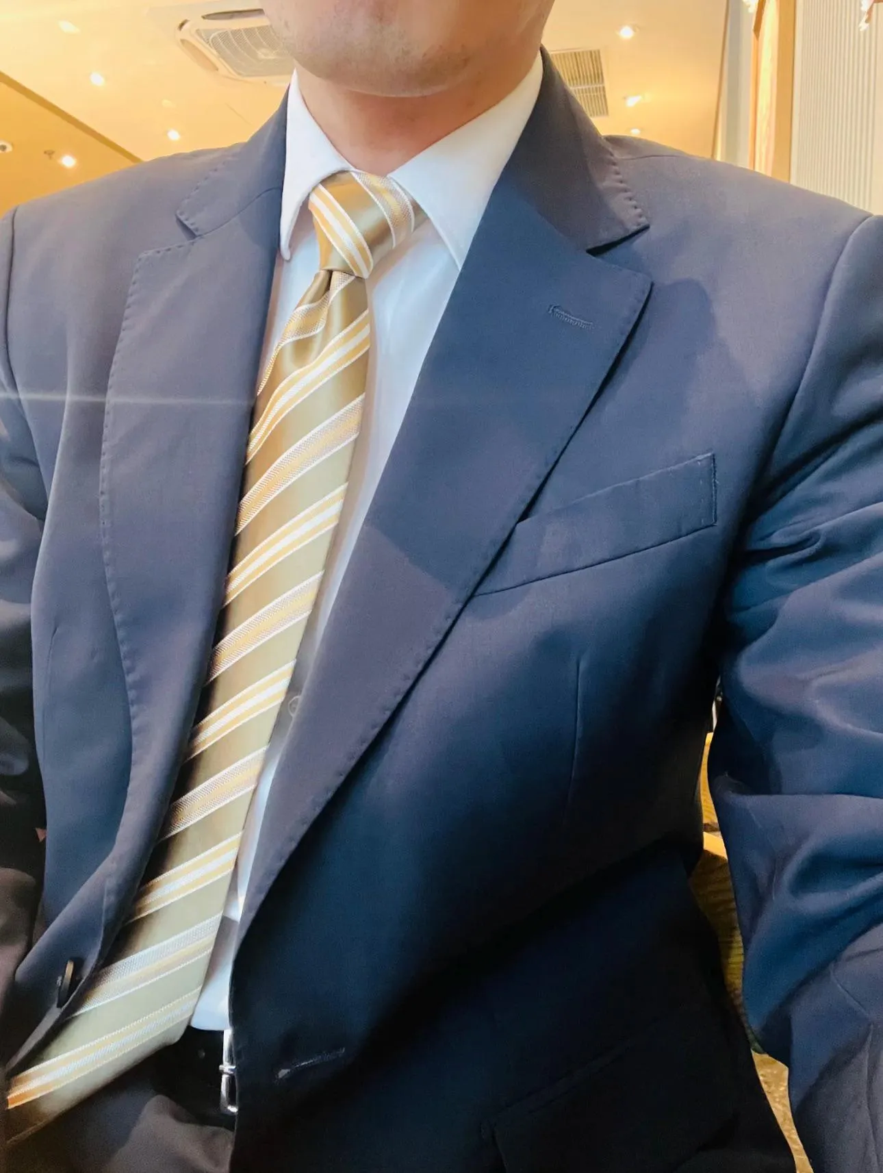 The clothes you wear at work look handsome.