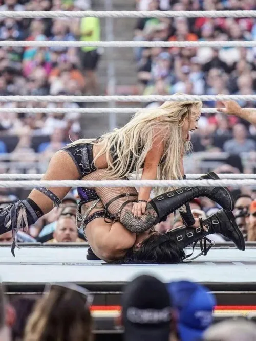 Liv Morgan stacking Rhea Ripley
