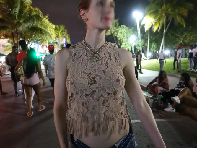 Strolling on Ocean Drive with my nipples poking through [IMG]