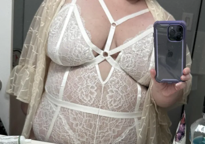 Crotchless white lace bodysuit