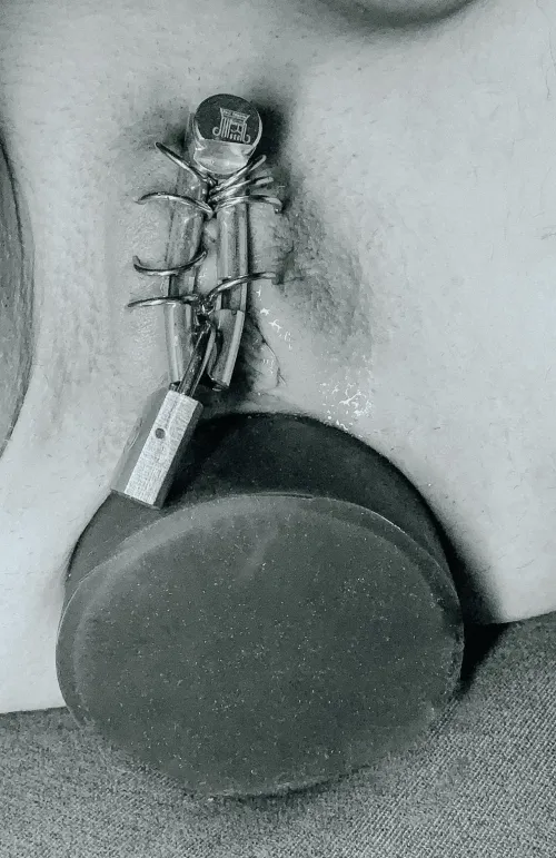 experimenting with the parts from my old chastity belt. love to feel the weight of metal (ftm)