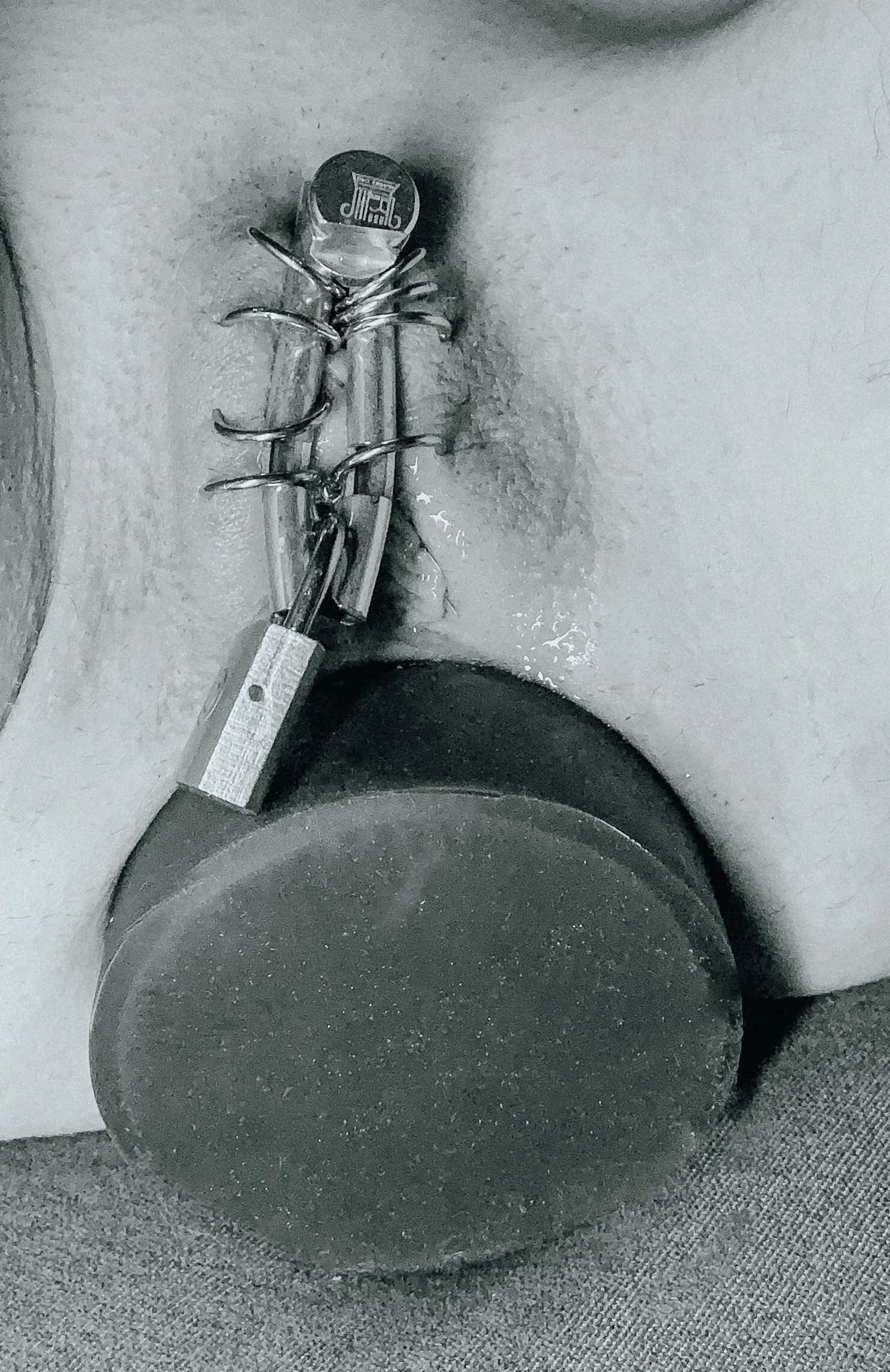 experimenting with the parts from my old chastity belt. love to feel the weight of metal (ftm)