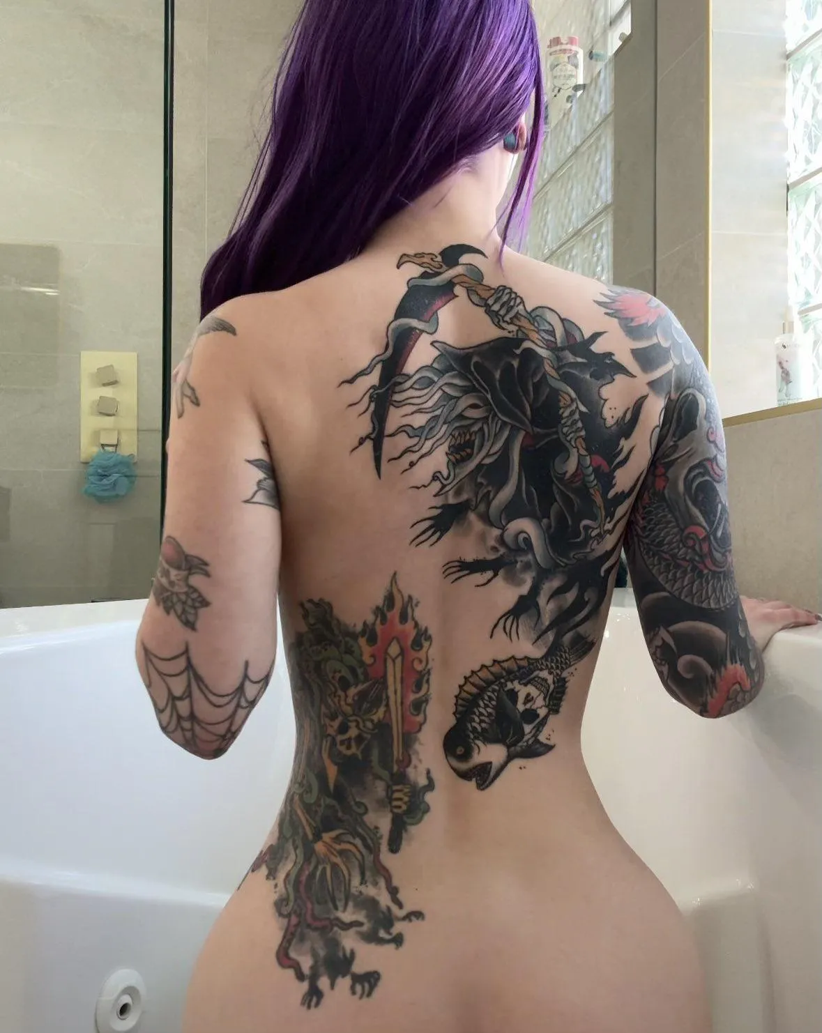 Love her tattoos