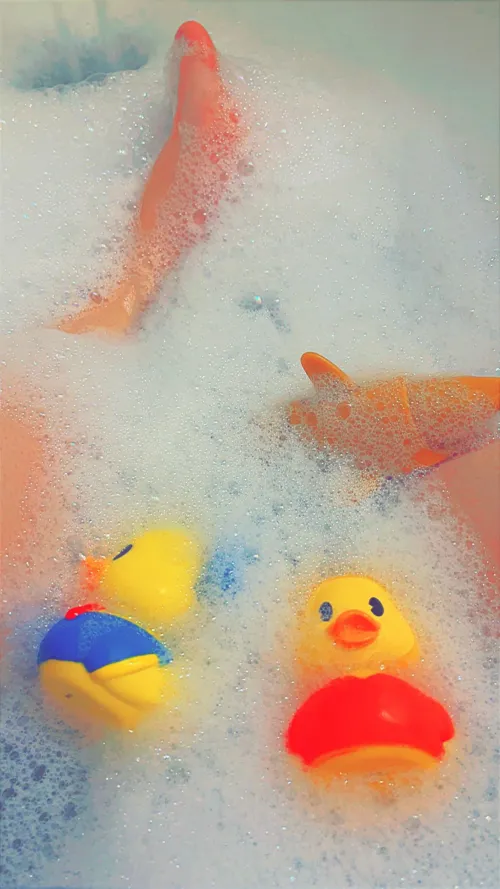 My first post. Bubble bath with my ducks and my shark toy from my kids meal.