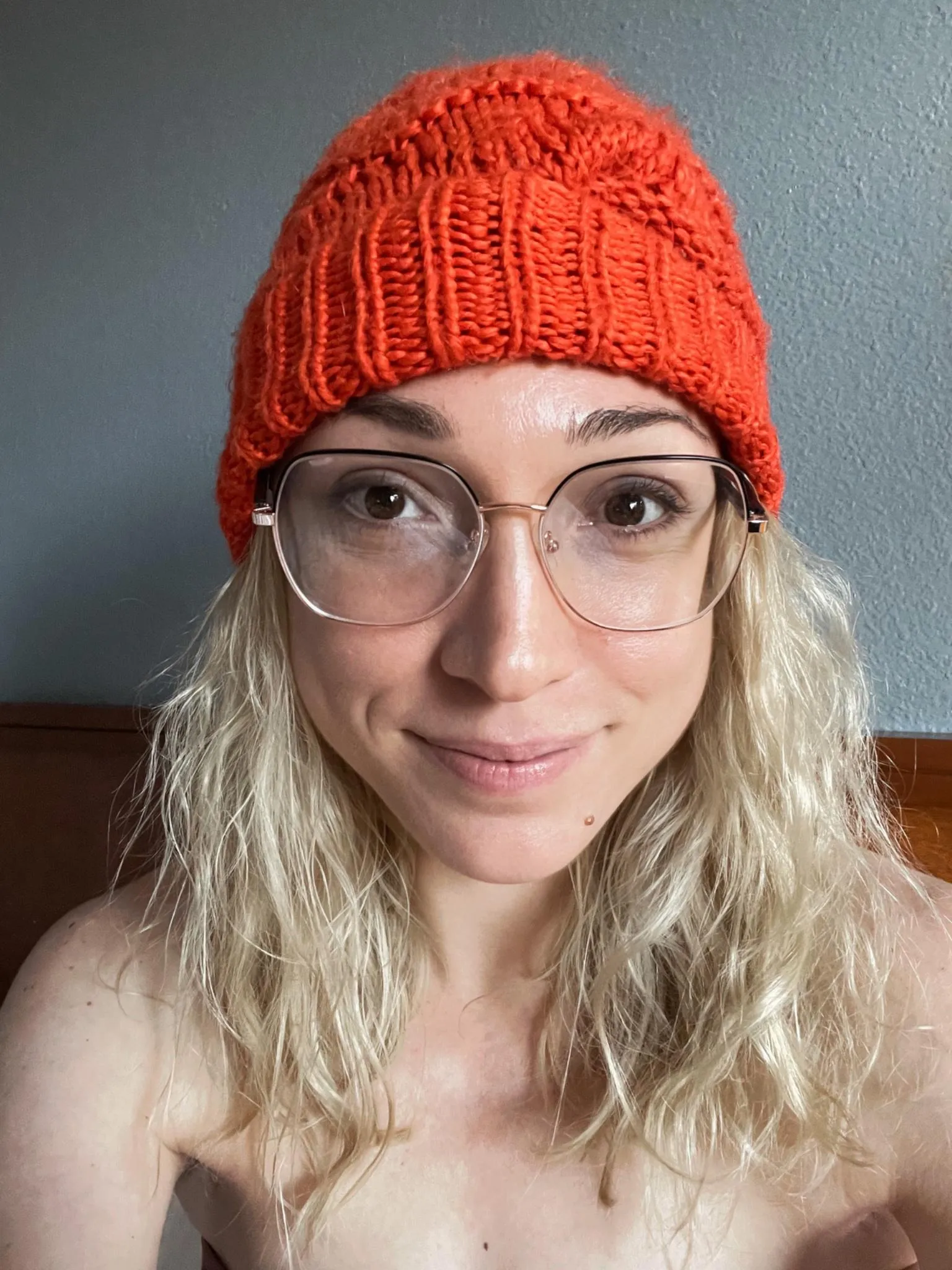 Glasses and wooly hat...