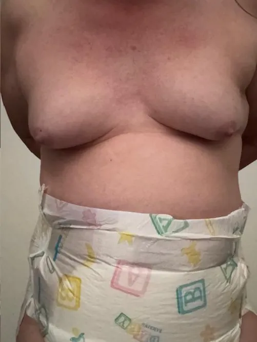 I love being a gurl and being diapered.  Boobies and Baby diapers are the best.