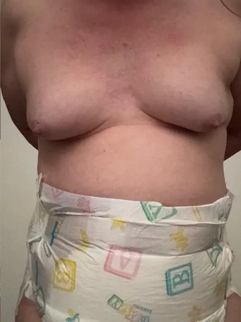 I love being a gurl and being diapered.  Boobies and Baby diapers are the best.