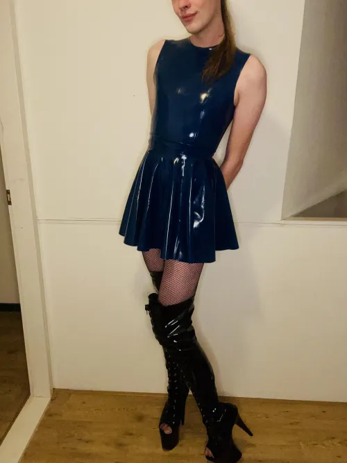 Latex dresses and fishnets always go so well together