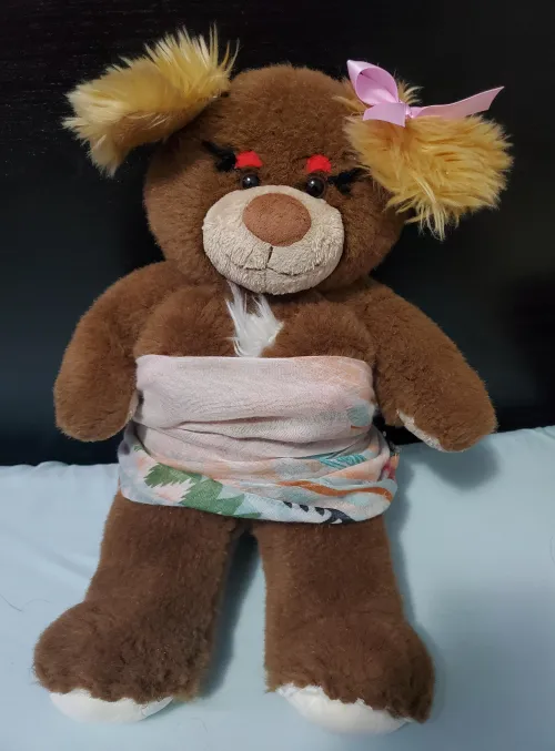 Elise is a little too well-edowed to fit into ordinary stuffie clothing, so she is trying on a this makeshift dress instead!