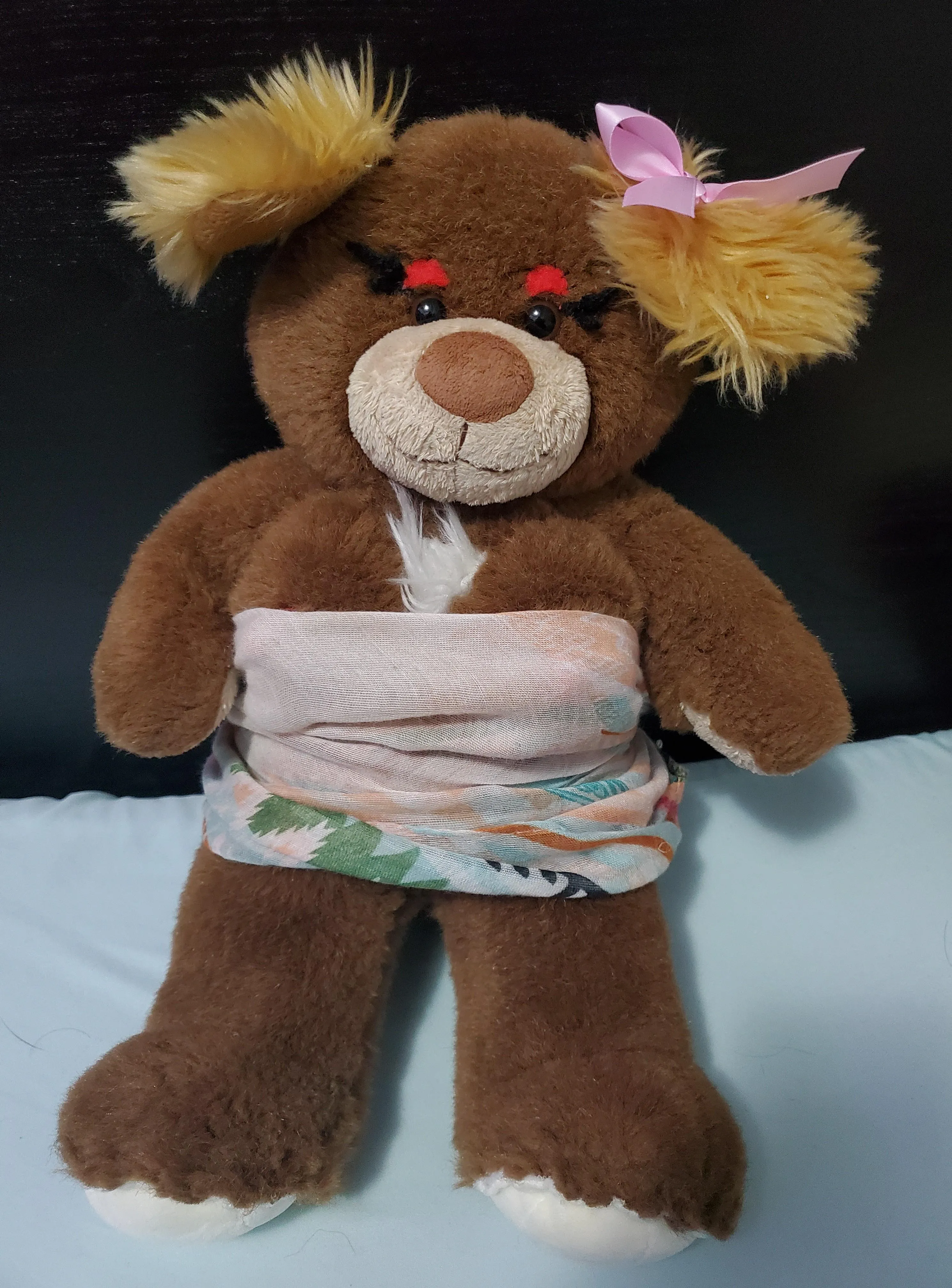 Elise is a little too well-edowed to fit into ordinary stuffie clothing, so she is trying on a this makeshift dress instead!