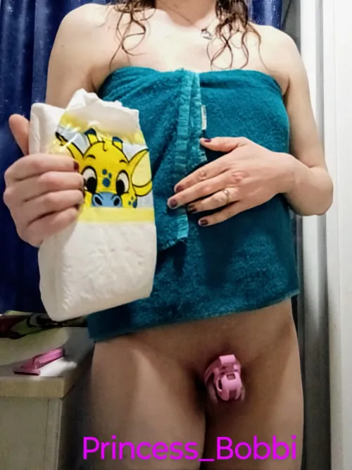 Fresh from a boiling hot shower, it's diaper time. 🙂