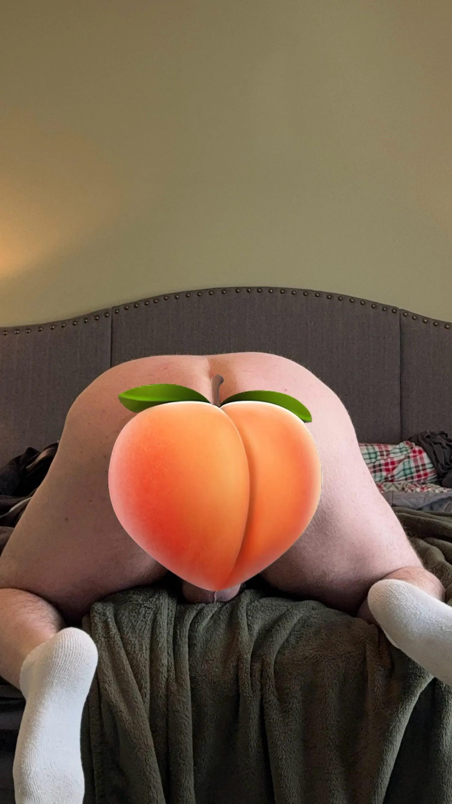 Bent over, socks on, peach out — should I take it all the way?