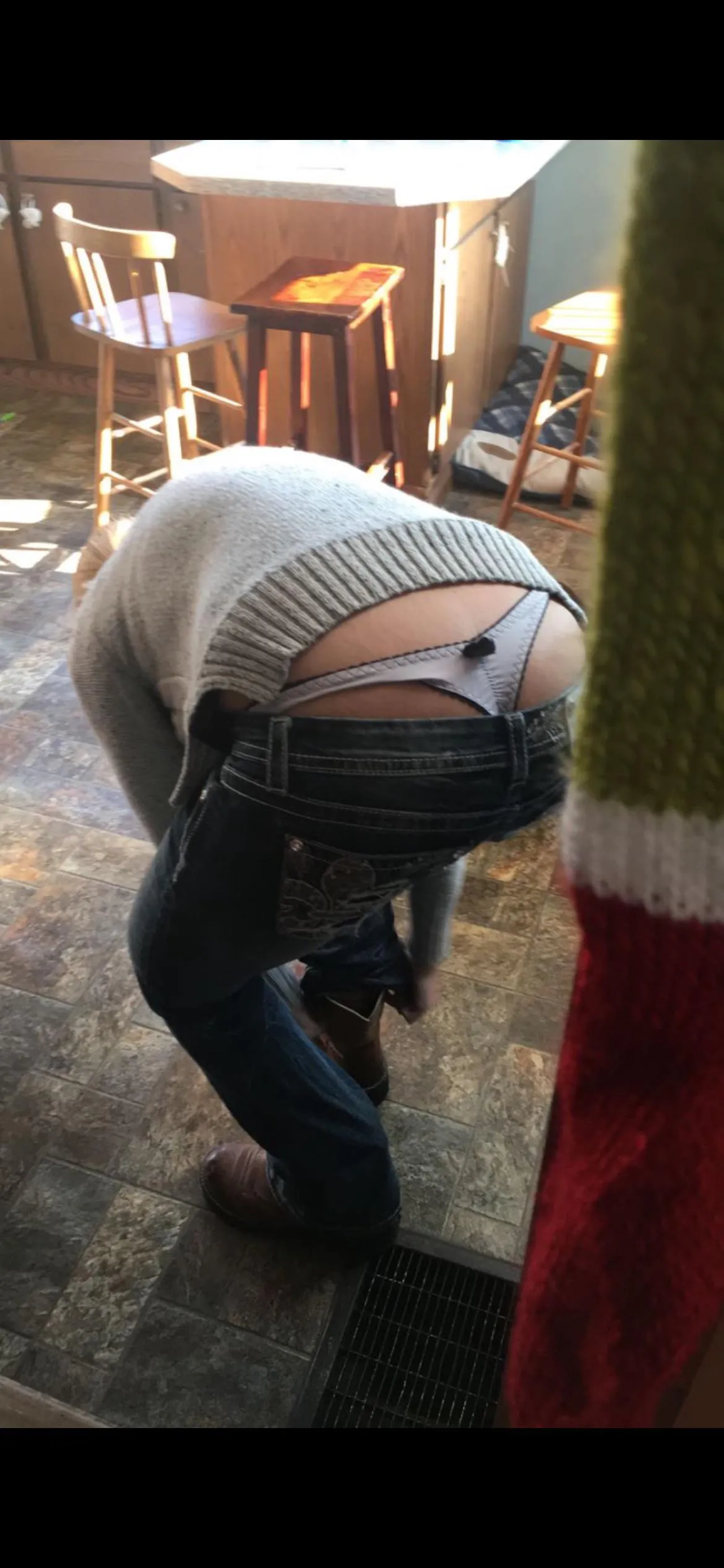 Watching her put boots on