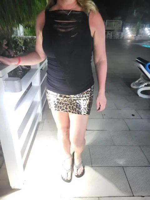 Sexy leopard leather mini skirt, see through top for dinner and the show