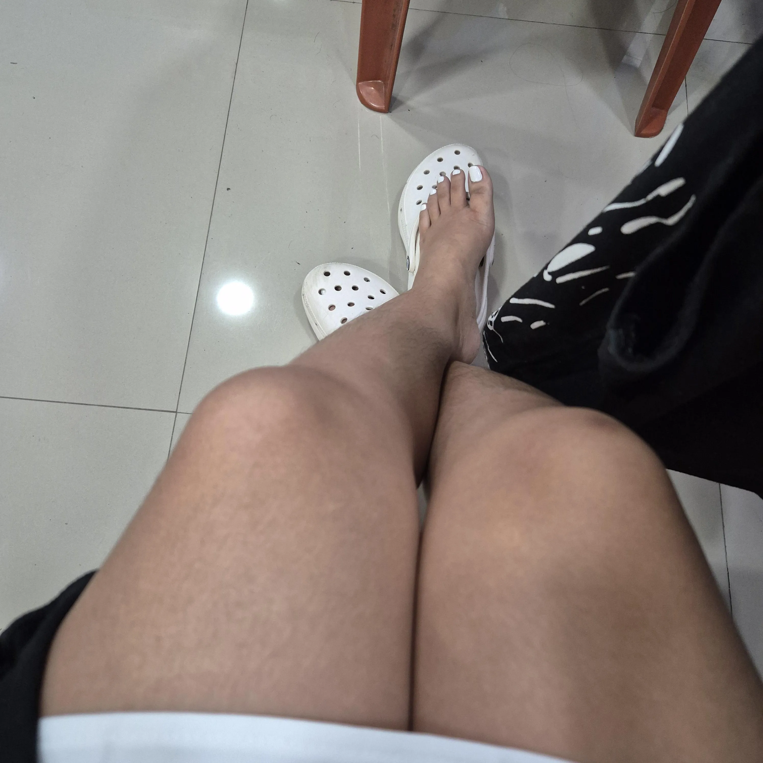 White nails and white crocs 💗