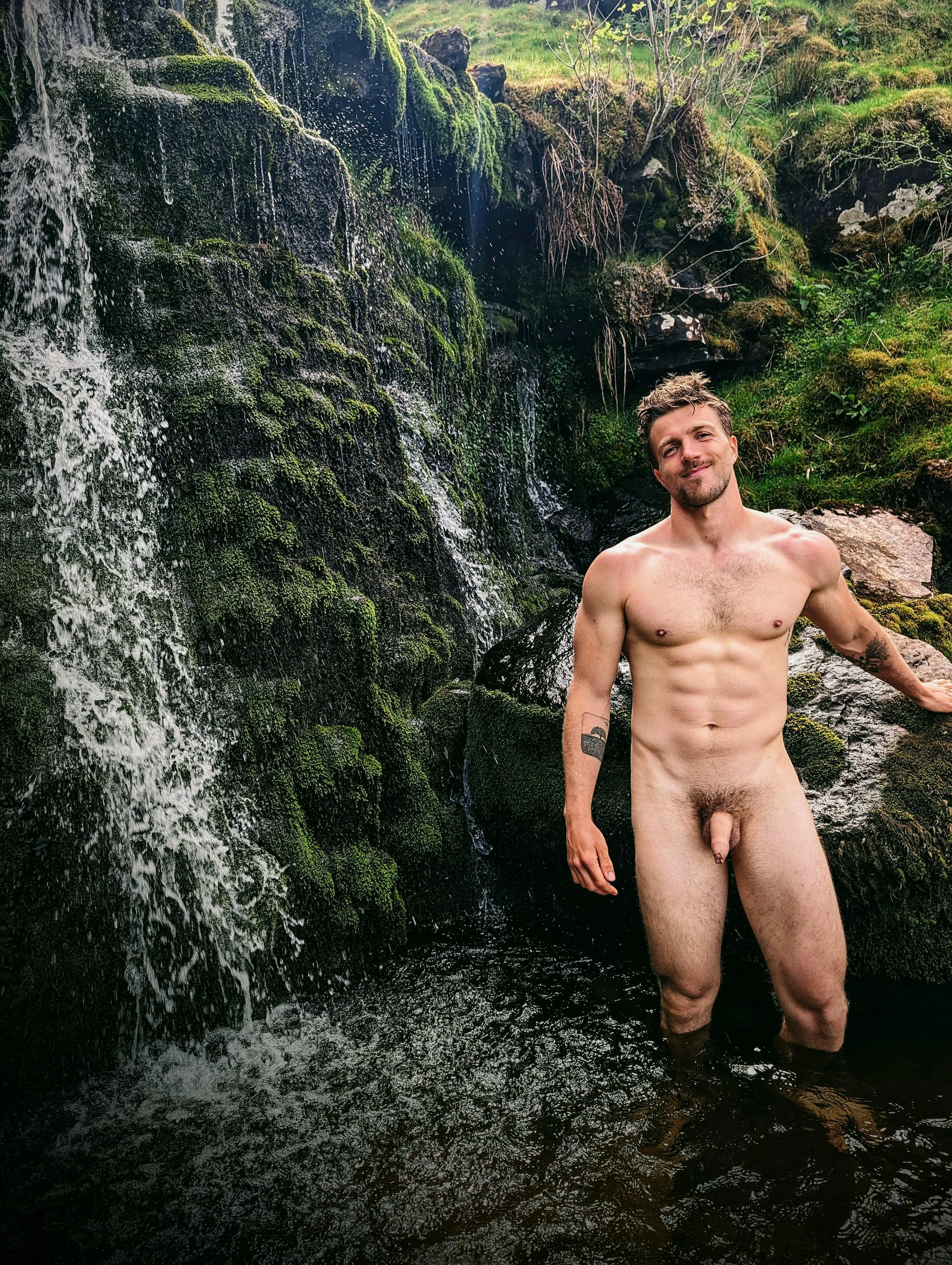 This will be the best picture you see all day of a hot naked man . In the elements