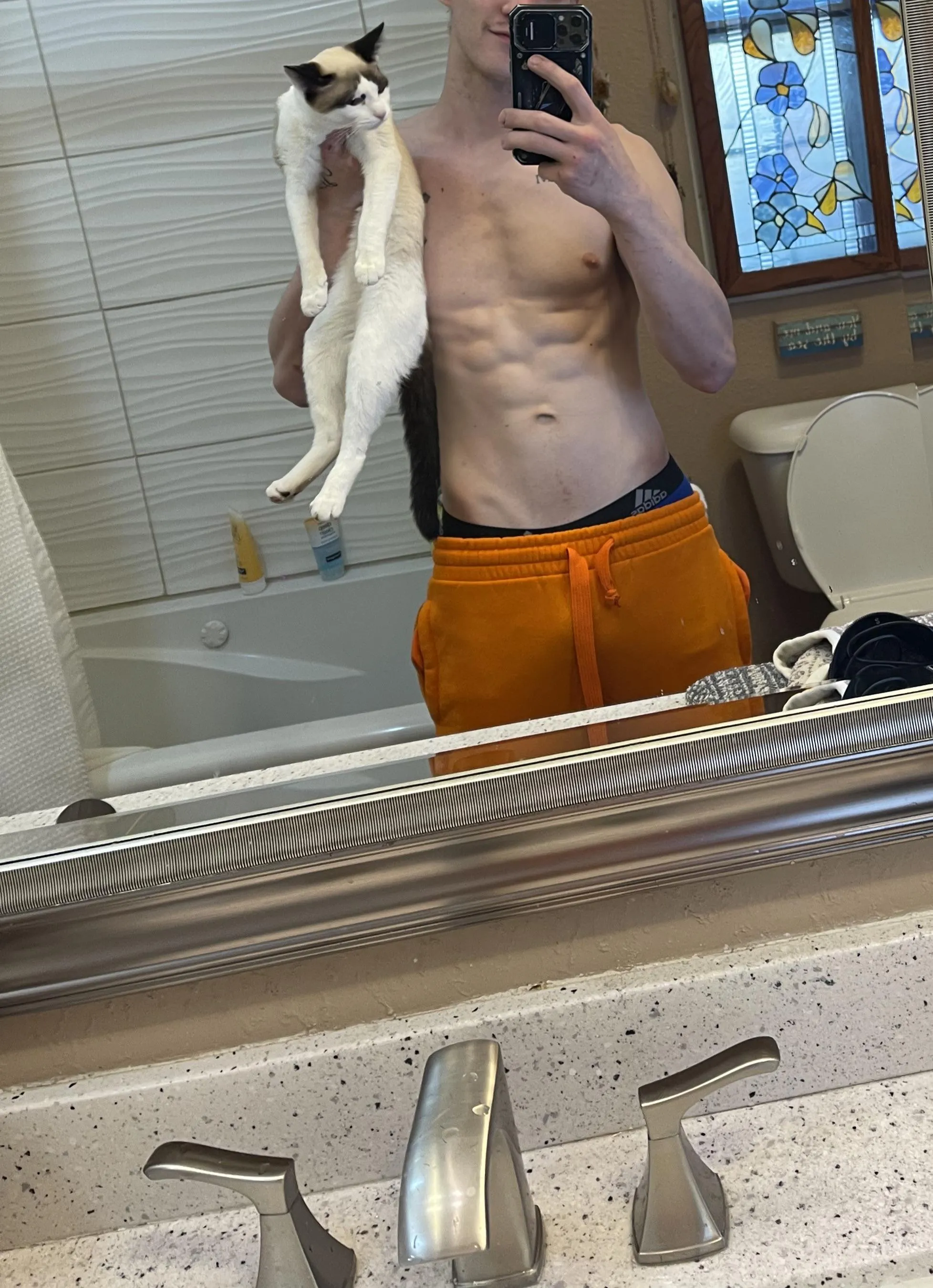 [25] abs holding pussy. Wish I wasn’t talking about the cat…