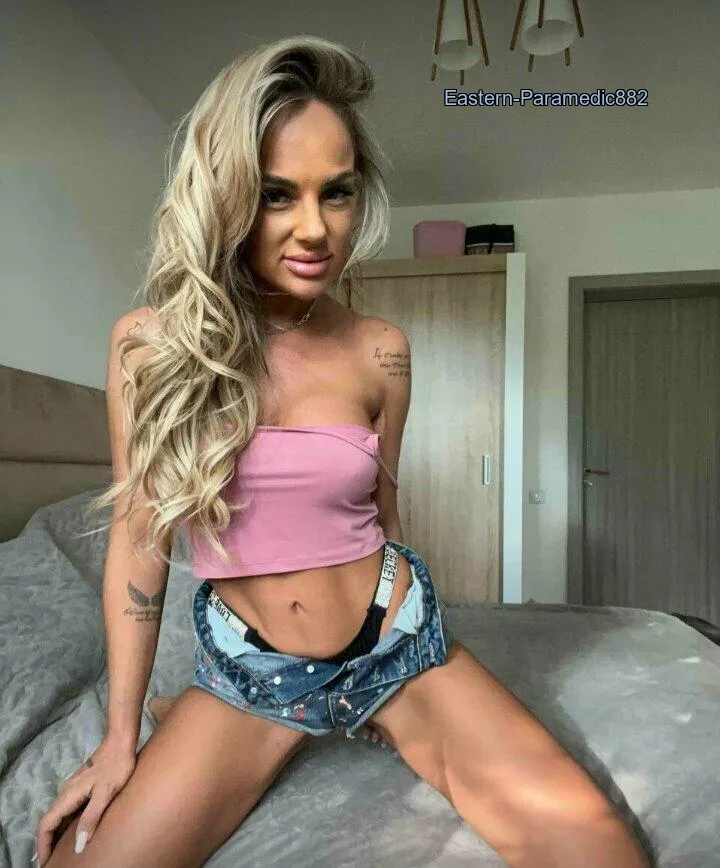 Sneak a peek at beautiful underwear peeking through ripped jeans. What a view.