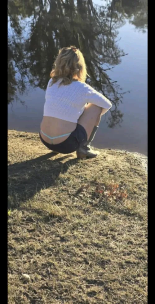 Ripples kiss the shore with secrets softly told, Reflections dance in hues of pink and gold.