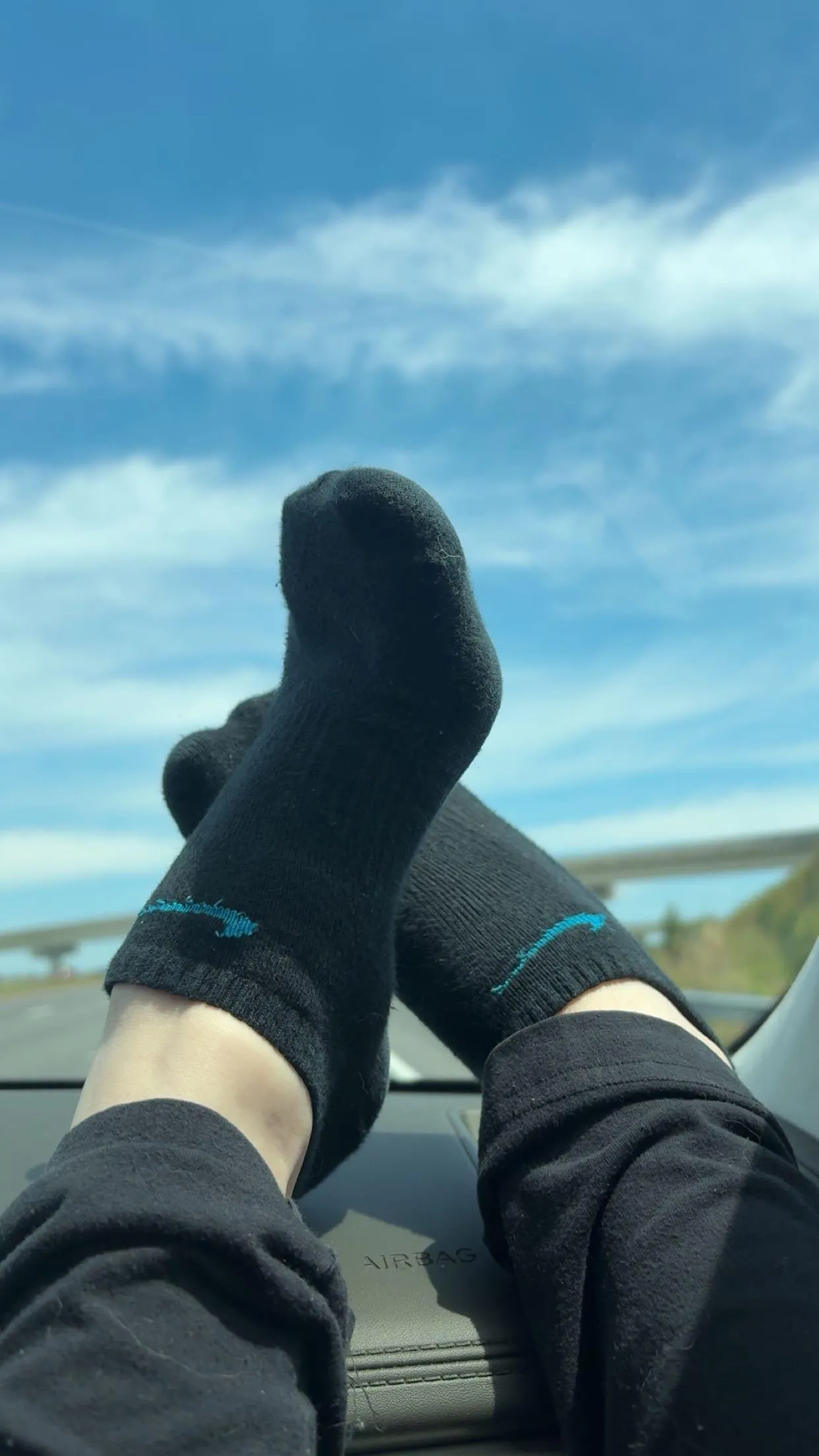 Would my feet on the dash distract you?
