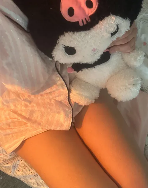 cuddling with my new kuromi stuffie in my new pink pjs😍