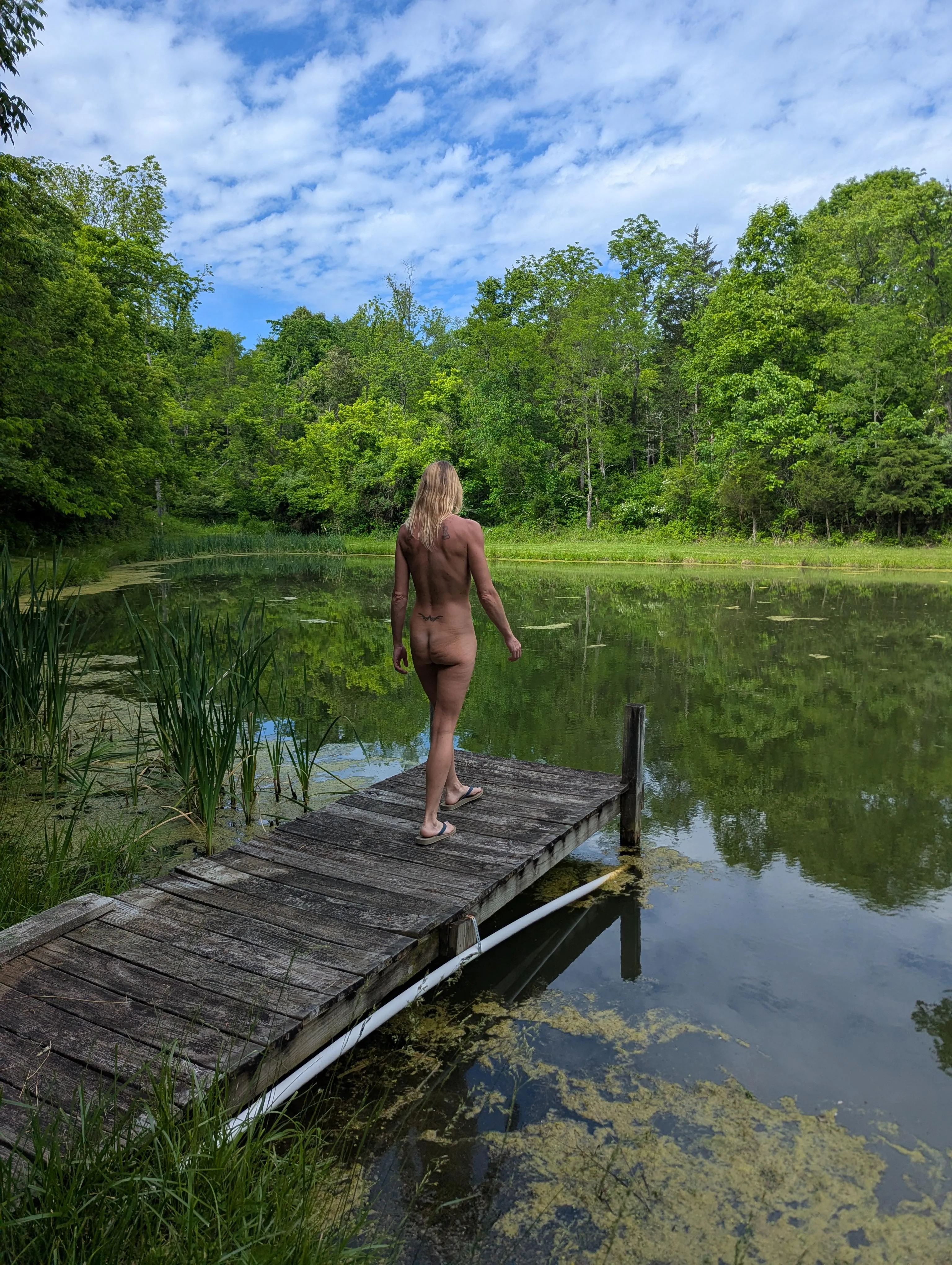 Found a pond while hiking naked.