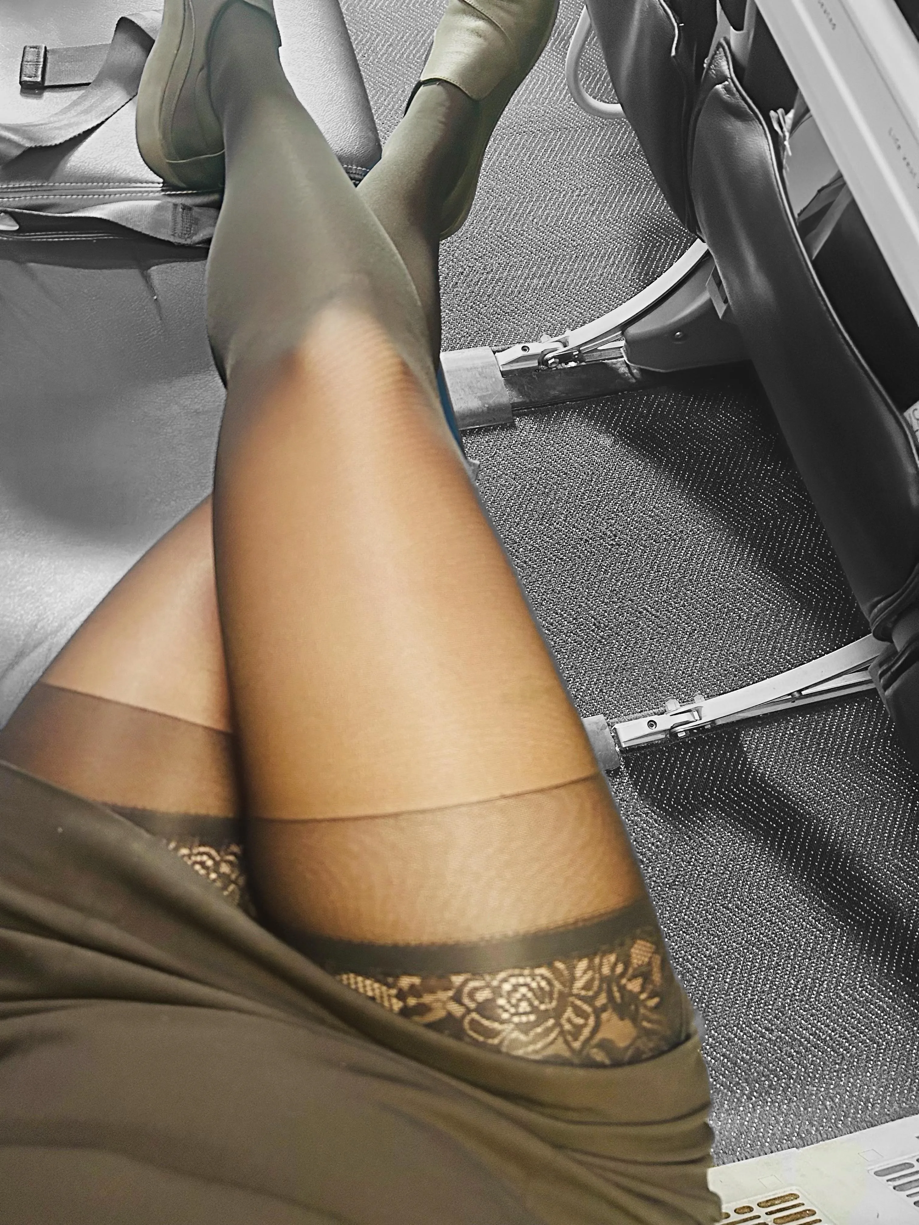 Strapped in, stockings tight, and thighs just barely behaving. Think you could keep your hands to yourself if you were in 6C?