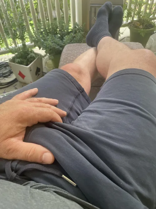 57  porch time black socks after yard work.