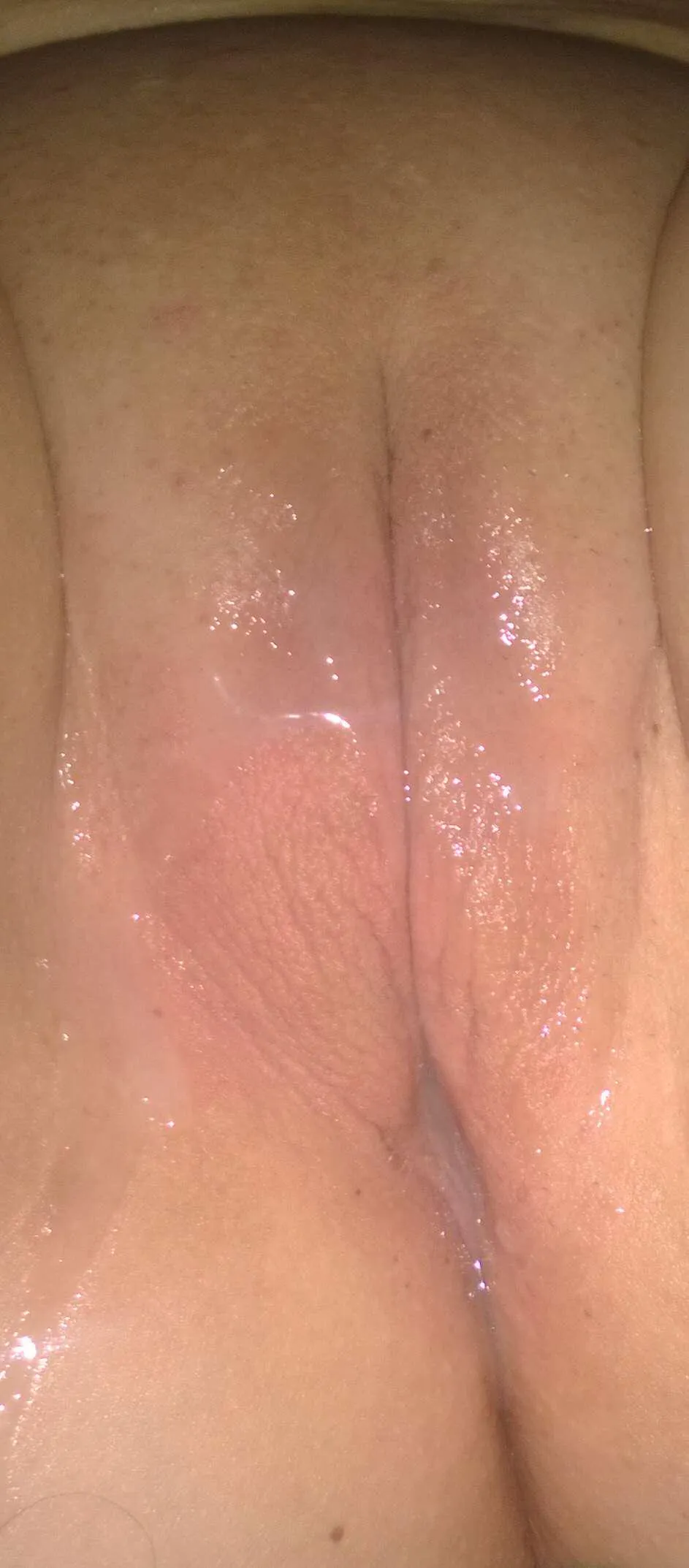 A touch of sperm coating my pussy .