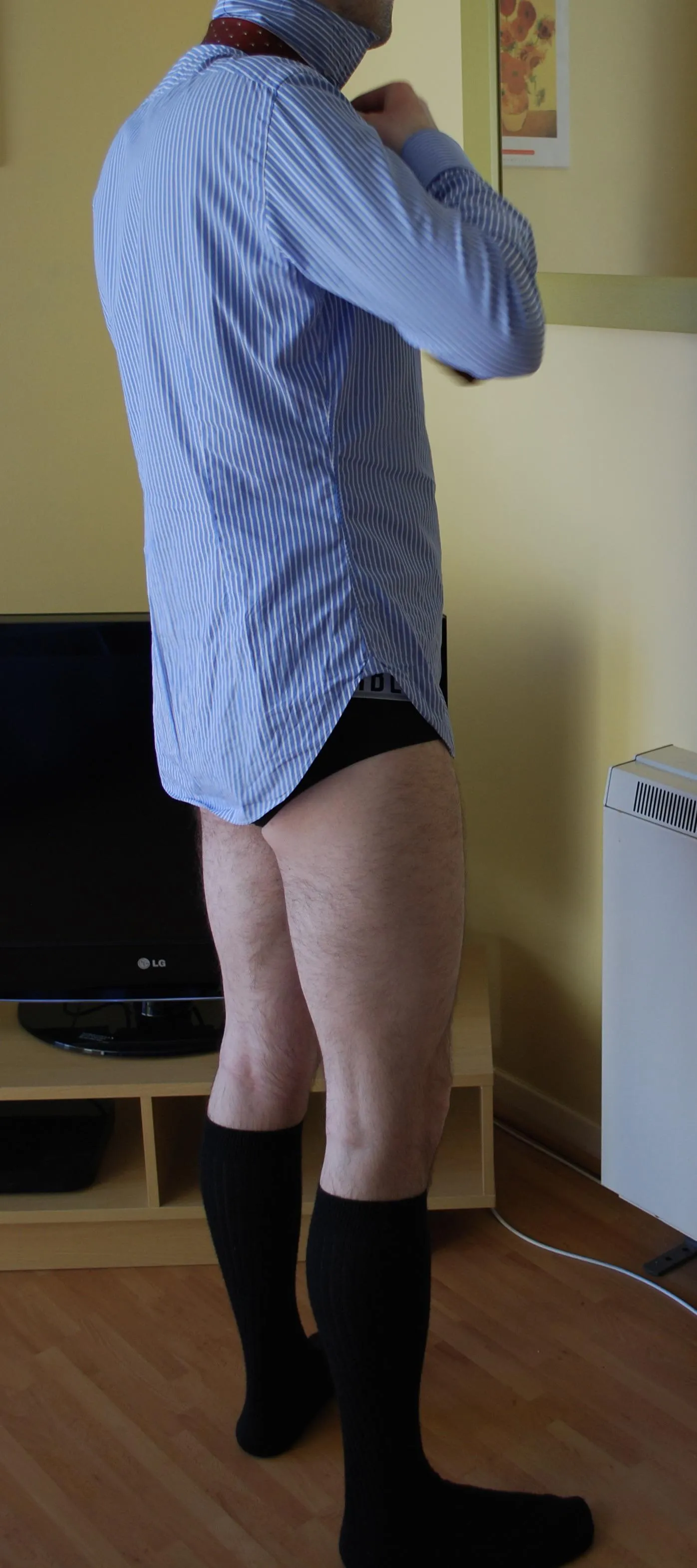 I know, there is no suit in this picture. However, I hope the business shirt, tie and OTC socks are enough?