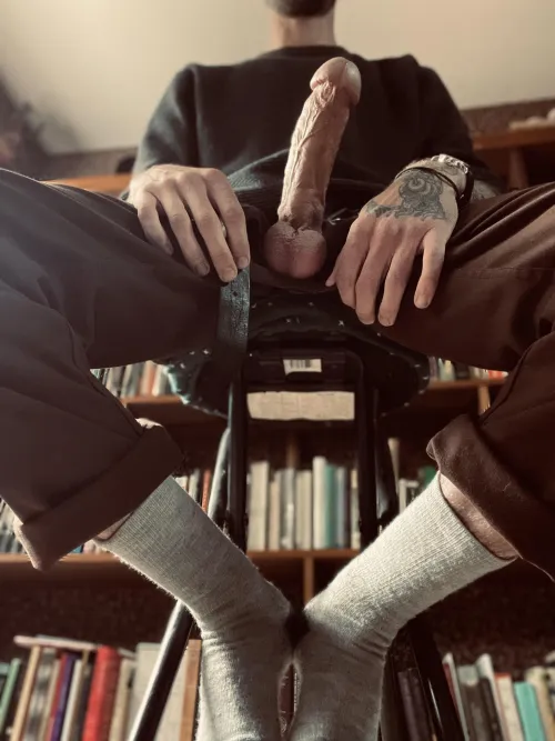 Stroking while doing some reading…