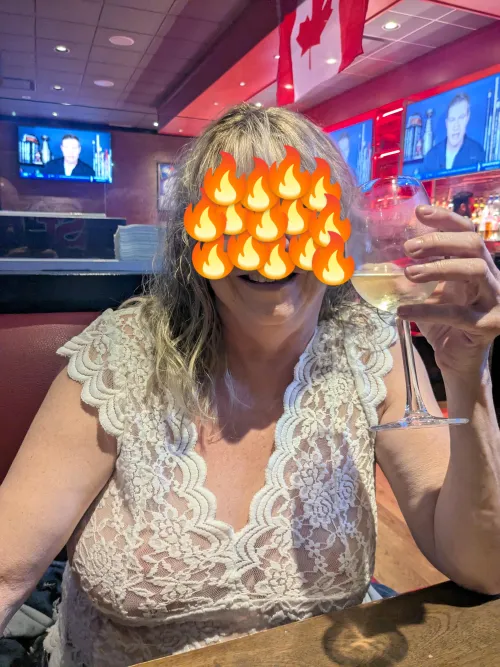 Out for dinner in her lace top.