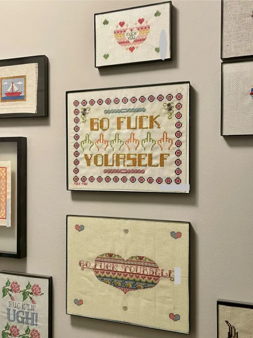 My uplifting wall of cross stitches!
