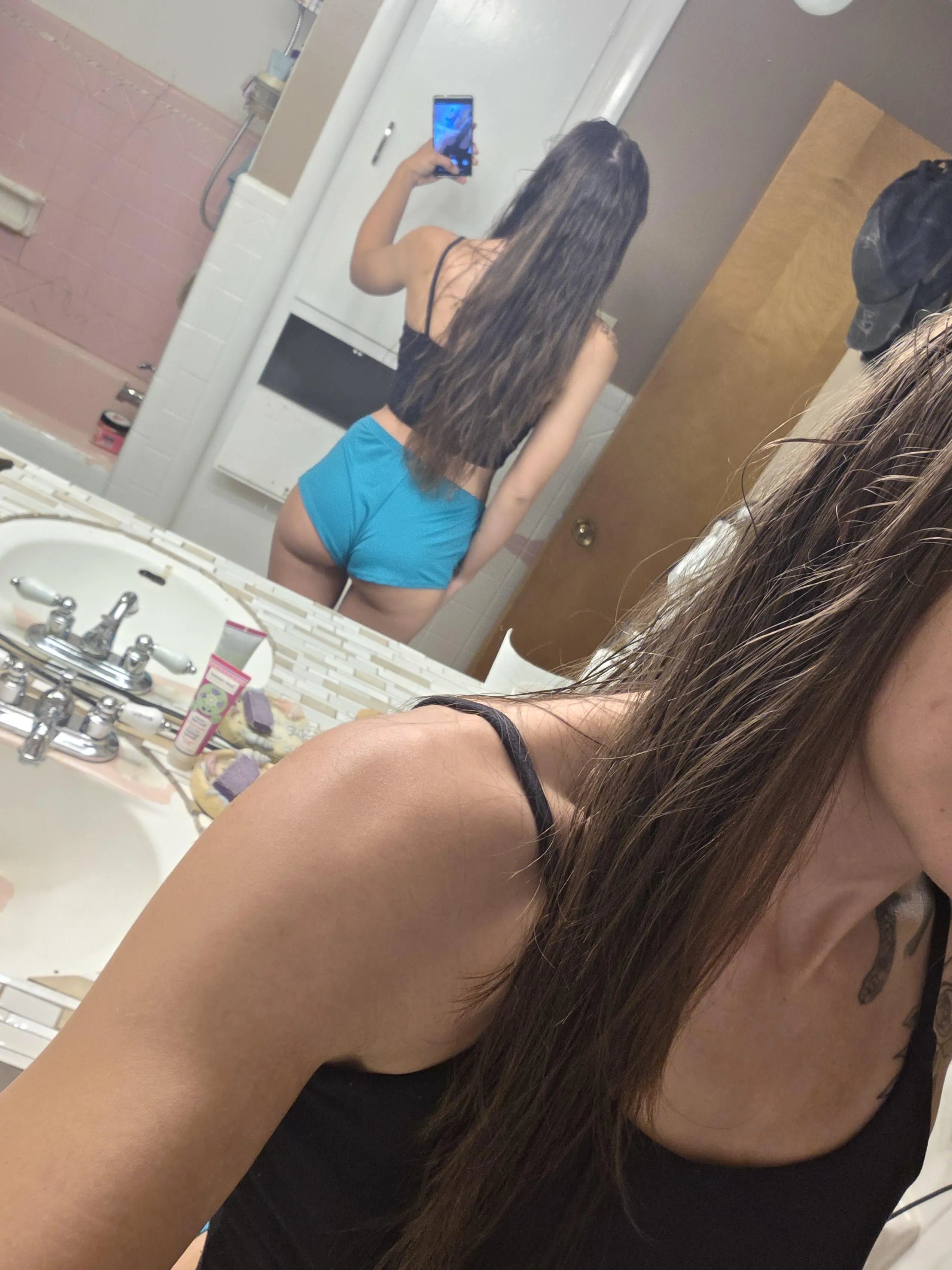 My hair is still damp from my shower