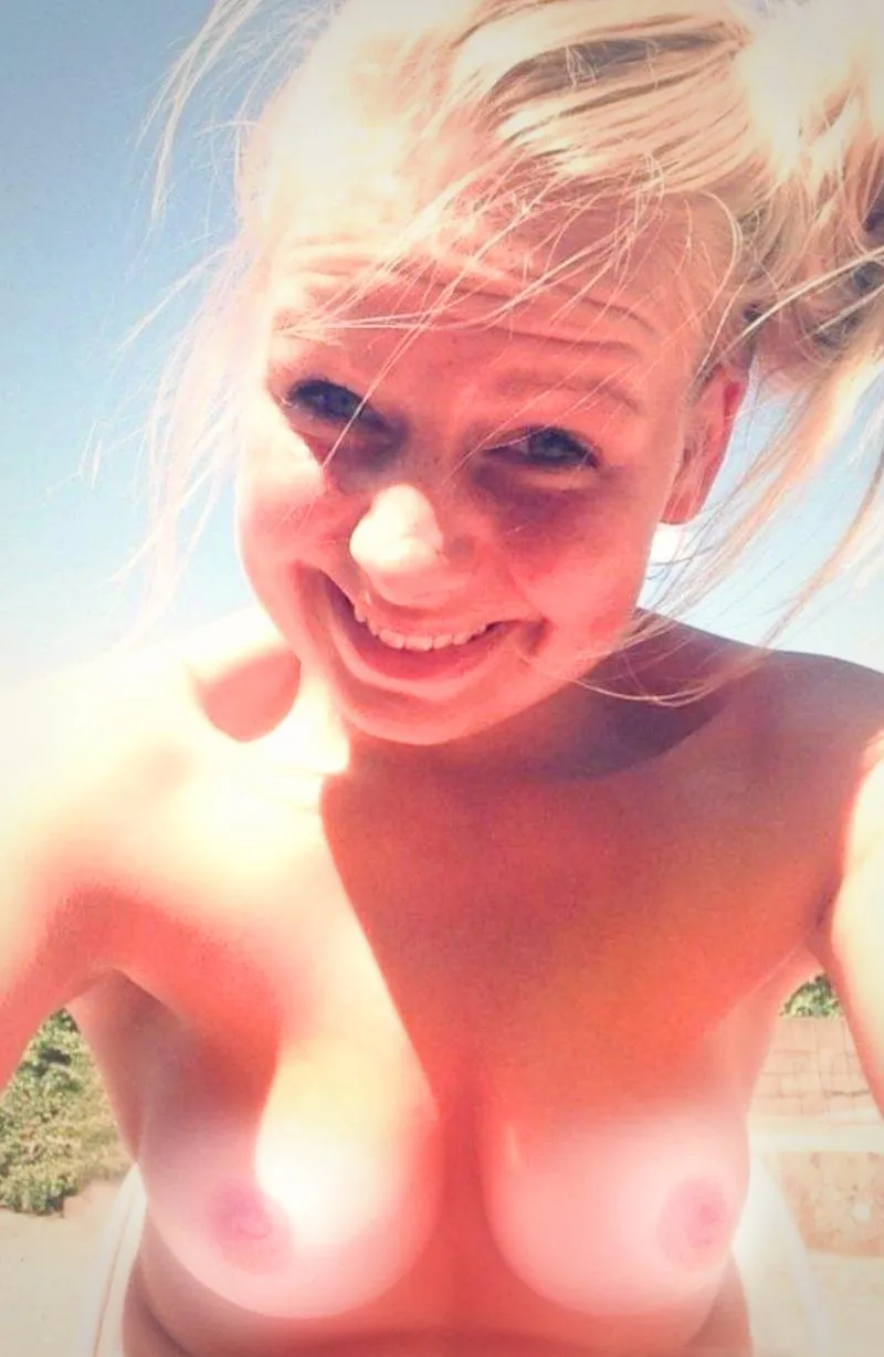 Cute blonde topless