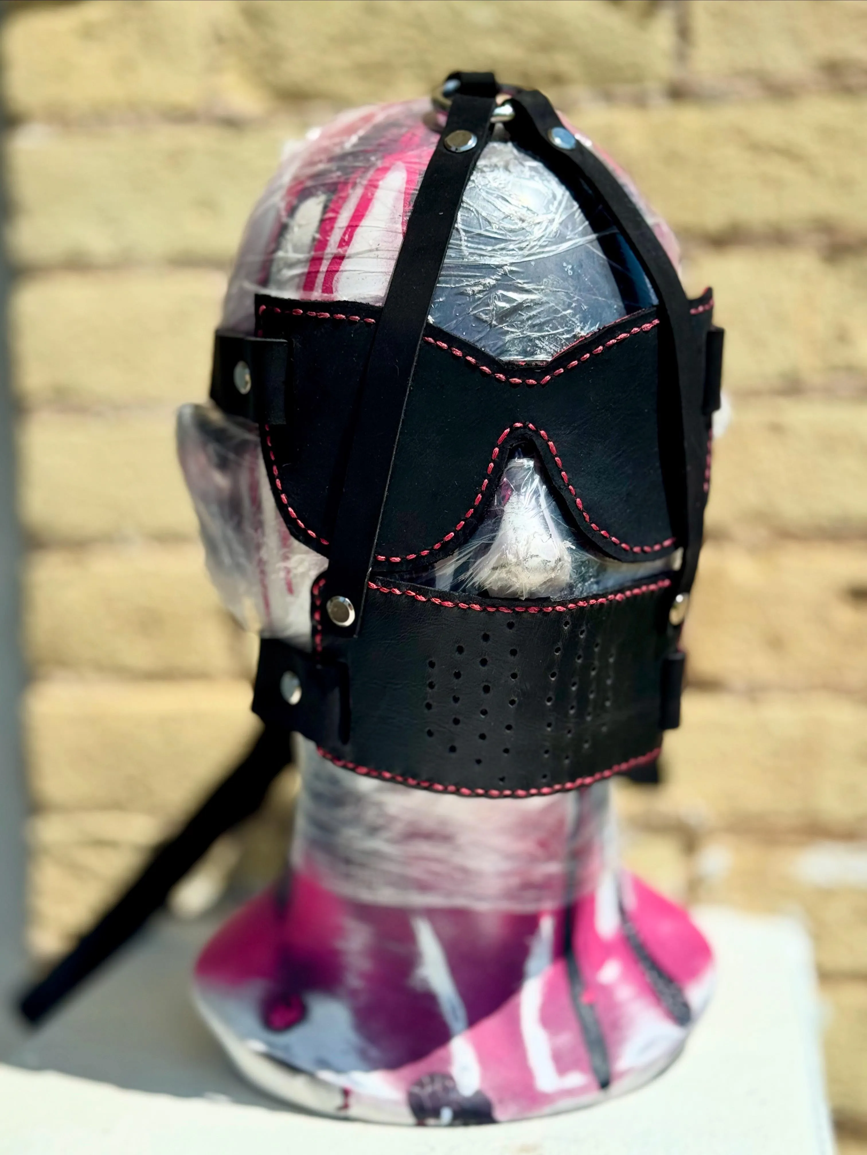 Made this vintage styled piece of head gear. Cat eye blindfold and a mouth gag.