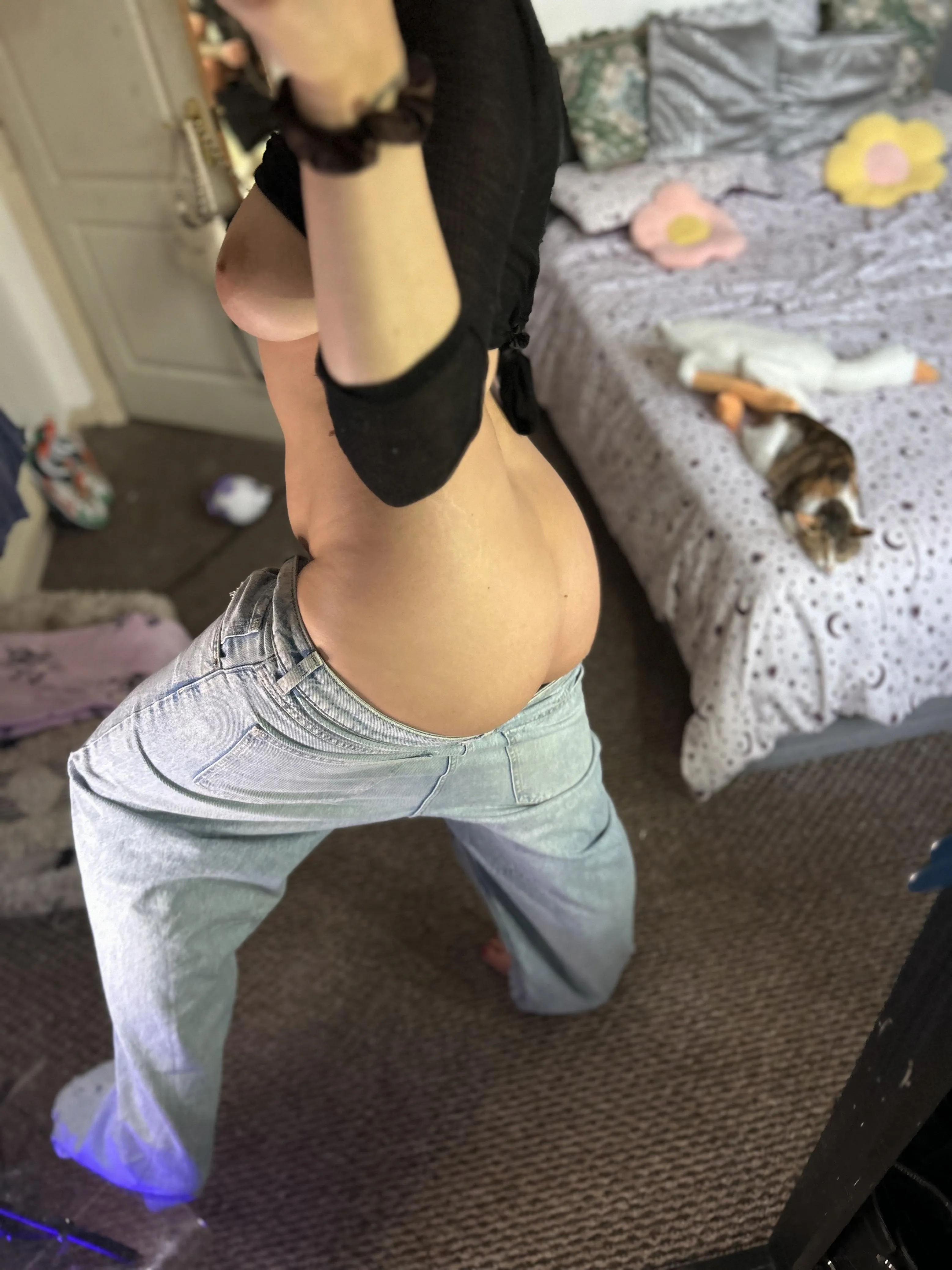 Curvy tease in denim, no bra needed